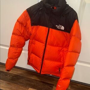 The North Face Men's Bold Orange and Black Puffer Jacket